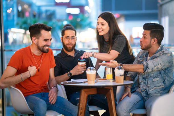istock Group of friends in cafe 1206872113