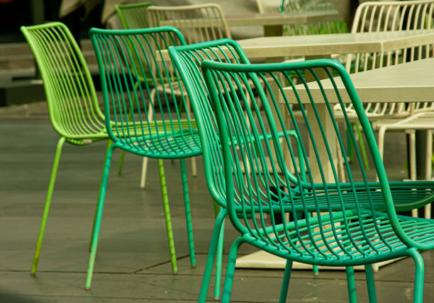Close up of metal patio furniture on grass