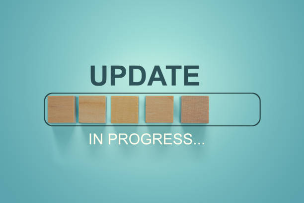 Wooden blocks with the word UPDATE  in loading bar progress. Wooden blocks with the word UPDATE  in loading bar progress. software update photos stock pictures, royalty-free photos & images