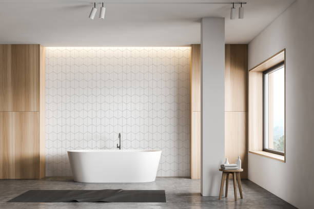 istock White tile and wood bathroom with tub and column 1206877655