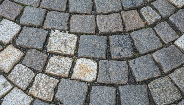 istock A fragment of the road surface in the old city. 1206877708