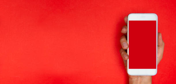 istock Woman Holding Red Screen Smart Phone 1206878854