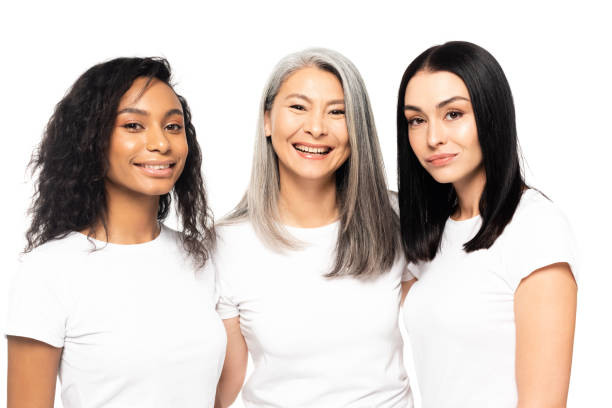 istock cheerful multicultural women looking at camera isolated on white 1206883599