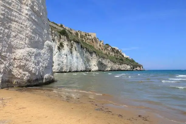 Gargano National Park in Italy - Pizzomunno Beach and white cliffs in Vieste.