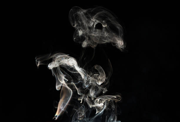istock Grey smoke abstract texture and isolated effect with dark background 1206887090