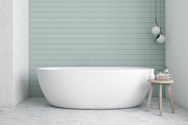 istock Blue and white bathroom interior with tub 1206887958