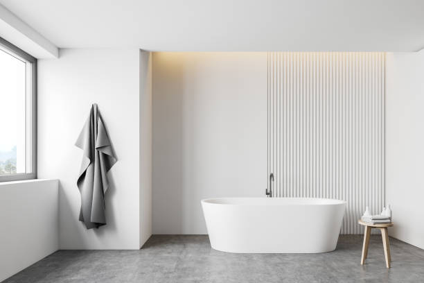 istock White loft bathroom interior with tub 1206889064
