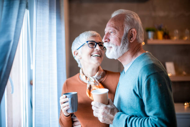 istock Beautiful senior couple drinking coffee. 1206889689