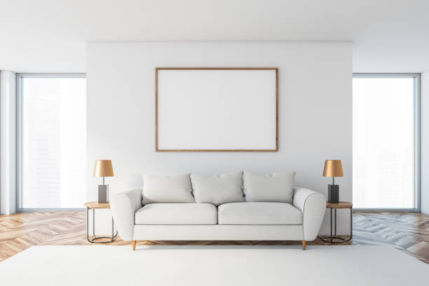 istock White living room with white sofa and poster 1206890896
