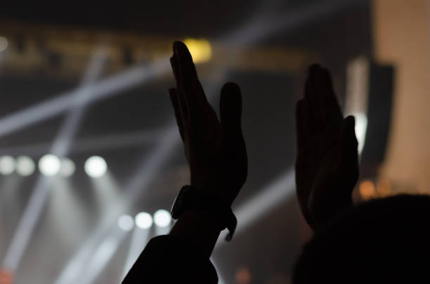 istock Applause in the concert and a scene in background. 1206893454