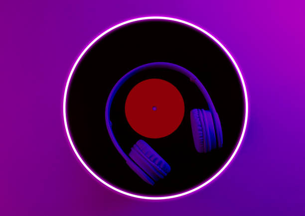istock Headphones with vinyl record. 80's synth wave and retrowave glowing circle futuristic aesthetics. Old fashioned abstraction concept 1206894561