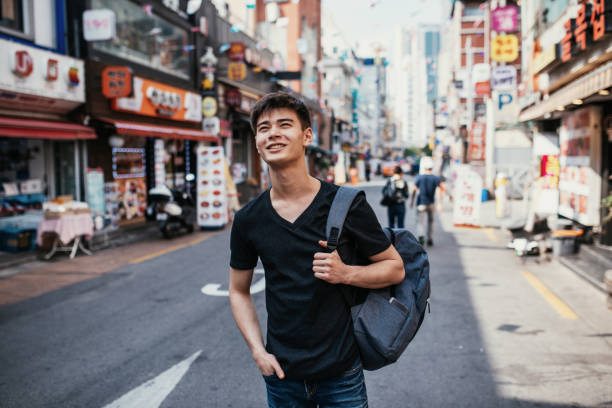 istock Millennial Korean guy exploring the city 1206894662