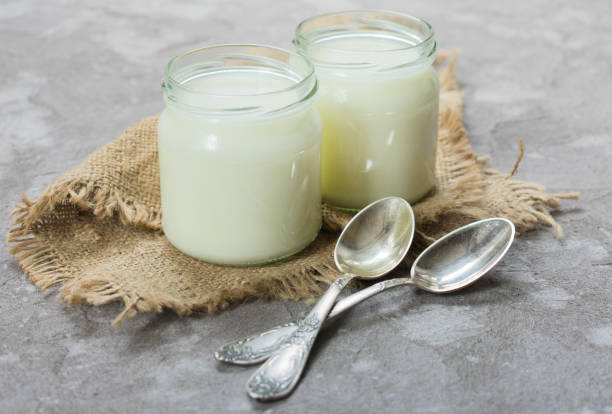 istock Two jars of natural yogurt 1206895149
