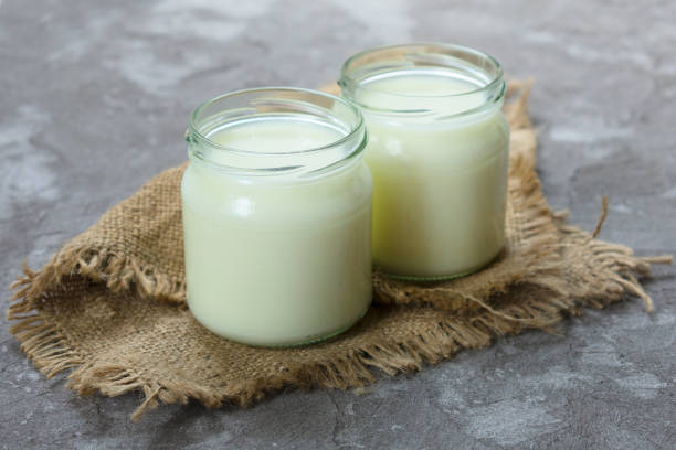 istock Two jars of natural yogurt 1206895890
