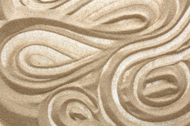 istock Drawings in the sand. Art therapy. Pattern of sand. Flat lay top view. 1206896459