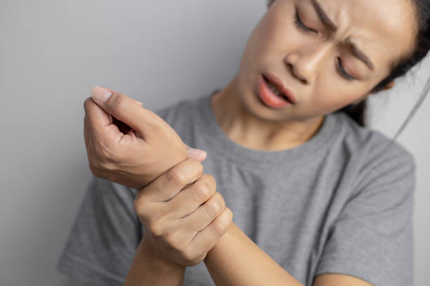 istock Woman suffering from pain in wrist. 1206896674