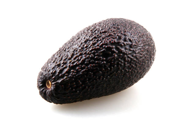 istock Fresh Hass Avocado Against White Background 1206896977