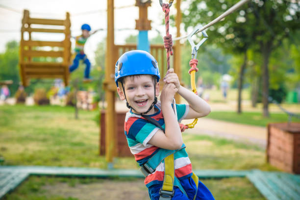 istock Young boy playing and having fun doing activities outdoors. Happiness and happy childhood concept 1206897115
