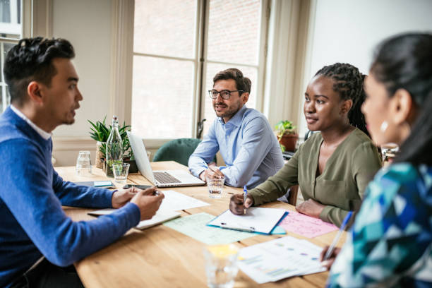 istock Millennial investors planning to develop sustainable project. 1206897155