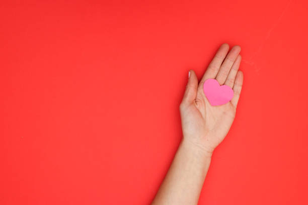 istock Romantic heart for Valentine's day in woman's hand 1206898306