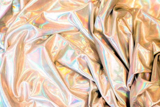 istock holographic texture background reflective fabric multicolored iridescent 1206899194