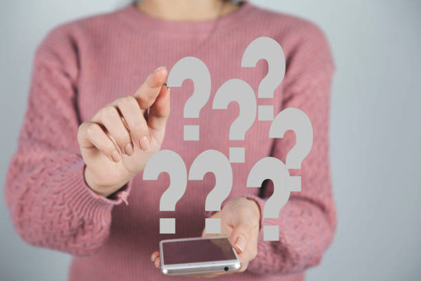 istock woman hand phone with question mark 1206899270