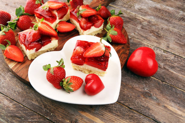 istock strawberry cake and many fresh strawberries on rustic table 1206899579