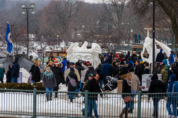 Crowds at the snow sculpting stock photo