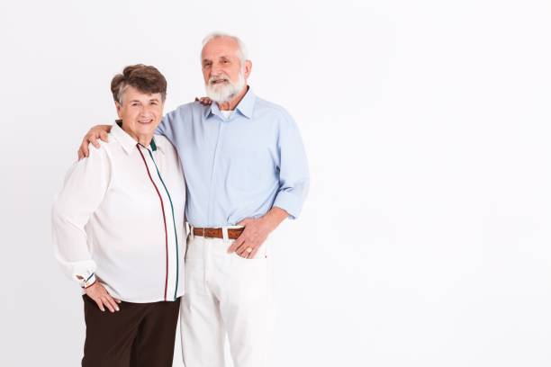 istock Seniors standing in room 1206902045