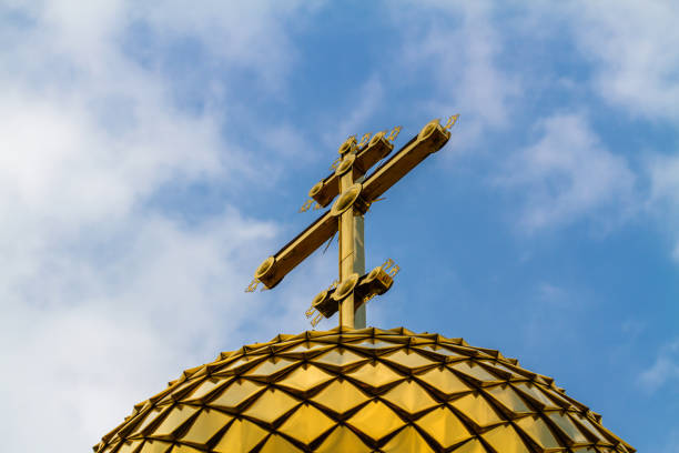 Golden dome orthodox church on blue sky background