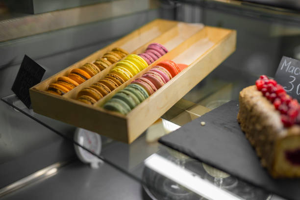 istock Colorful macaroons on the showcase 1206907325