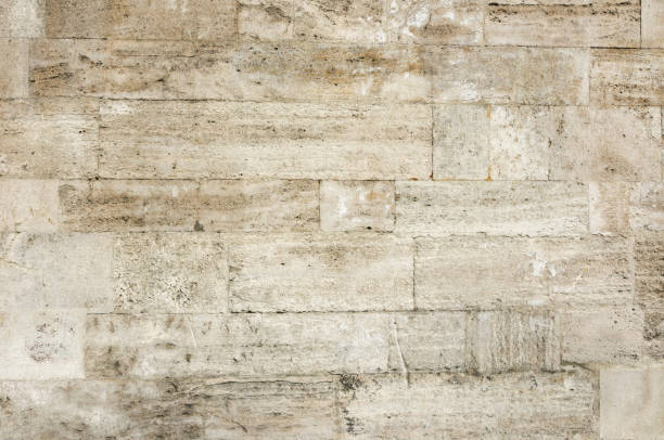 istock Old wall made of natural stone blocks. 1206907383