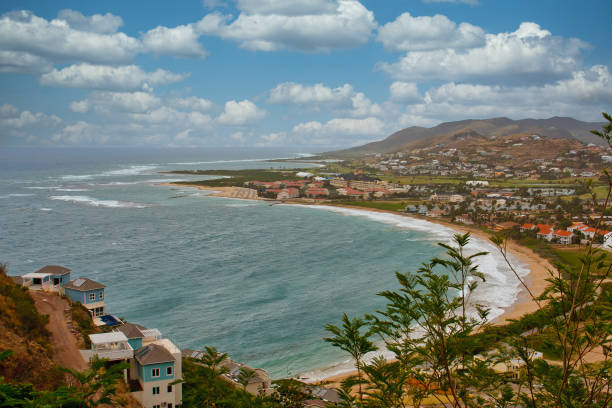 istock Curved Tropical Coast with Resorts and Condominiums 1206911143