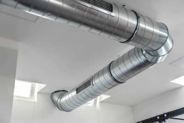 istock Vent system for indoor ventilation with metallic aluminum pipe and openings with grill for air extraction 1206912209