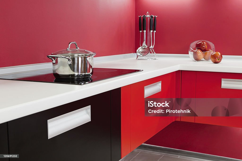 Modern kitchen with red decoration New modern kitchen furniture of red color Beauty Stock Photo