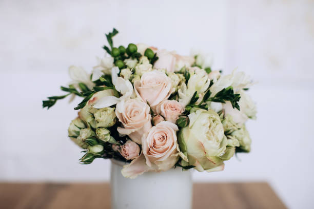 istock beautiful wedding bouquet of white roses 1206917038