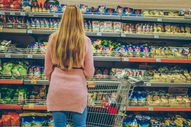 istock Woman at supermarket 1206925087