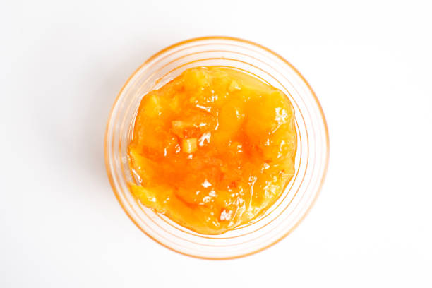 homemade orange jelly jam in bowl - chutney imagens e fotografias de stock