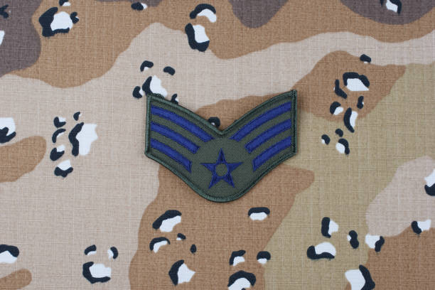 istock US AIR FORCE Senior Airman rank patch on desert camouflage uniform background 1206926119