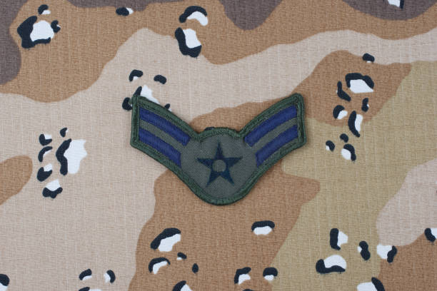 istock US AIR FORCE Airman First Class rank patch on desert camouflage uniform background 1206926158
