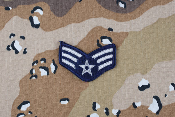 istock US AIR FORCE Senior Airman rank patch on desert camouflage uniform background 1206926164