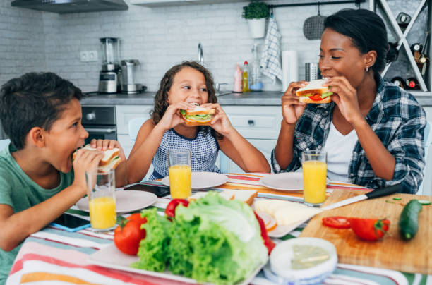 istock Hispanic family having breakfast at home. 1206926208
