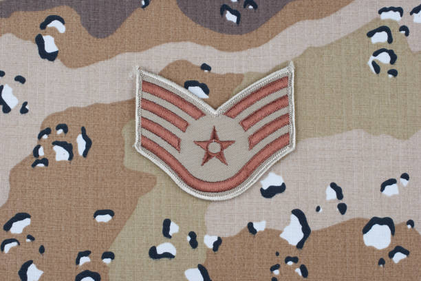 istock US AIR FORCE Staff Sergeant rank patch on desert camouflage uniform background 1206926255