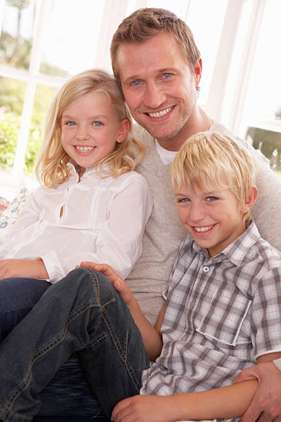 istock Father and children relaxing together 120692637