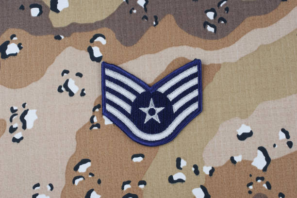 istock US AIR FORCE Staff Sergeant rank patch on desert camouflage uniform background 1206926421