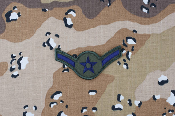 istock US AIR FORCE Airman rank patch on desert camouflage uniform background 1206926445