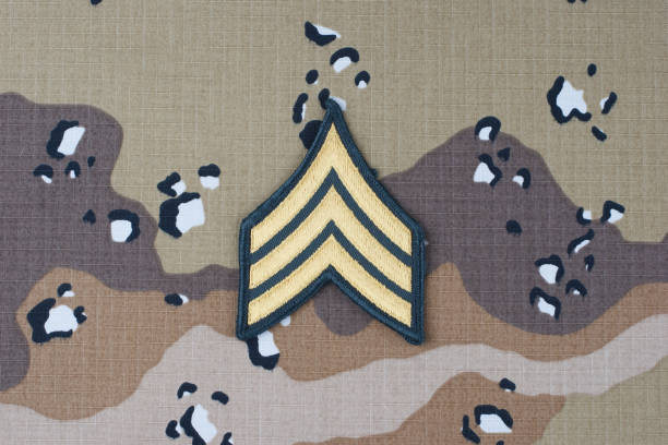 istock US ARMY Sergeant rank patch on desert camouflage uniform background 1206926487