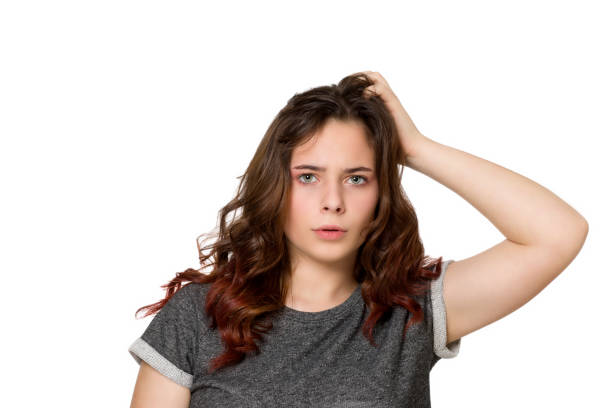 istock Young teenager thinking over a white background 1206930383