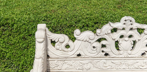 istock stone bench sculpture in the garden 1206935961