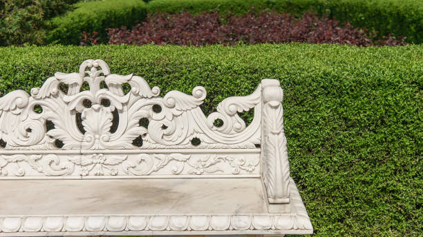 istock stone bench sculpture in the garden 1206935992